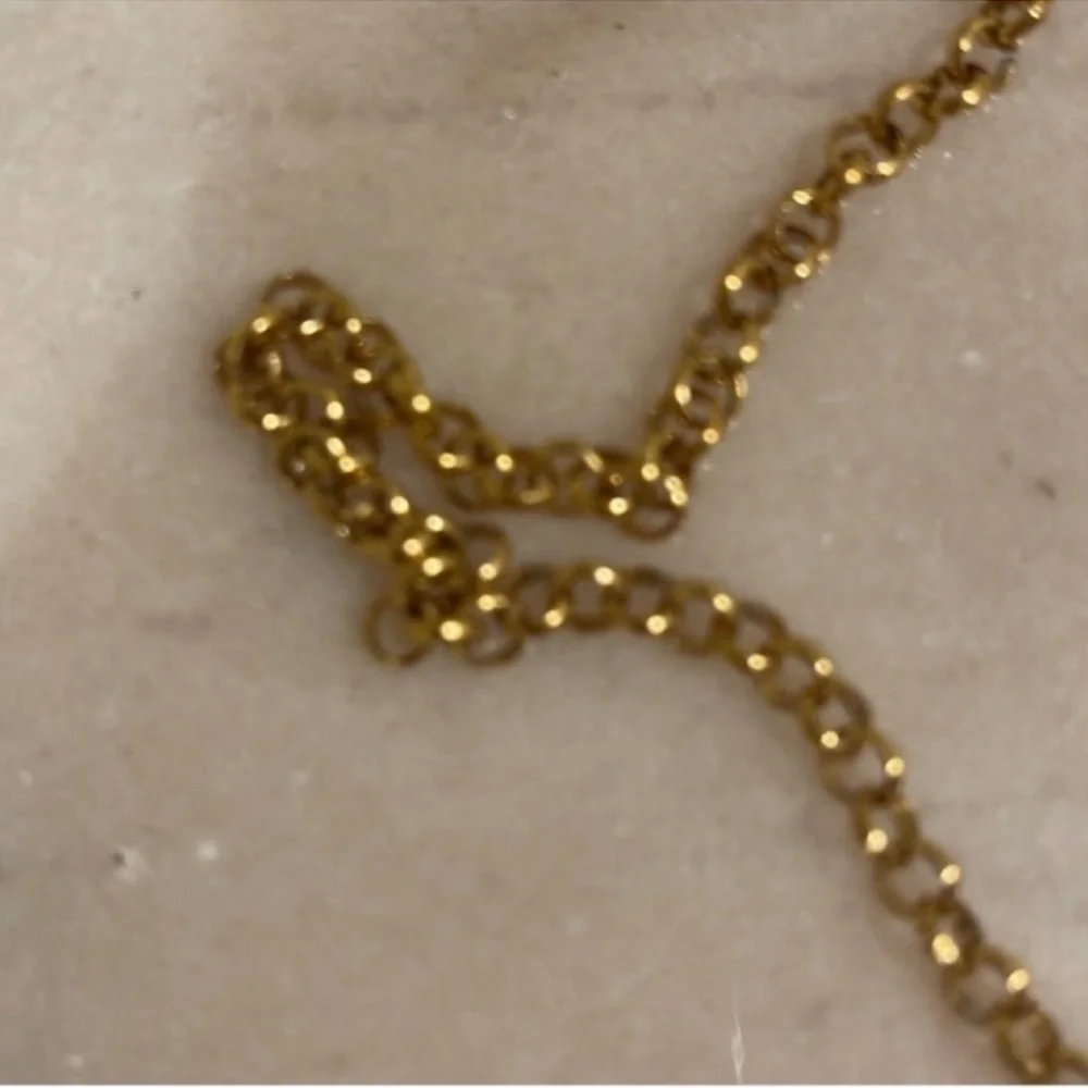 Chanel Holiday Fragrance Charm With Gold and Pearl Necklace